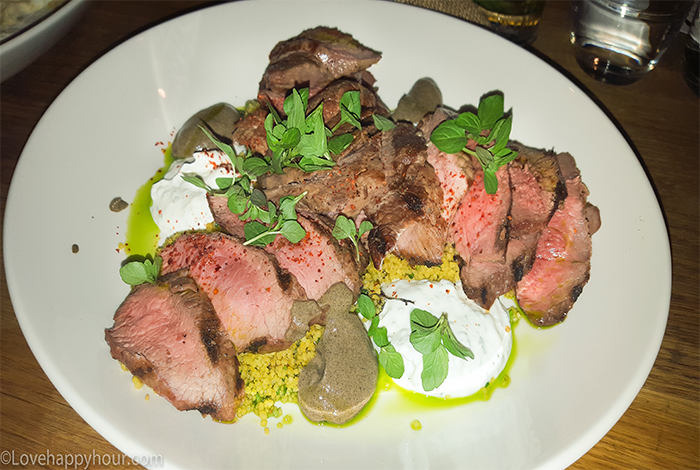 Grilled Sonoma Lamb Leg with yogurt, dates, cous cous, mint and charred eggplant at the Ace Hotel in Los Angeles.