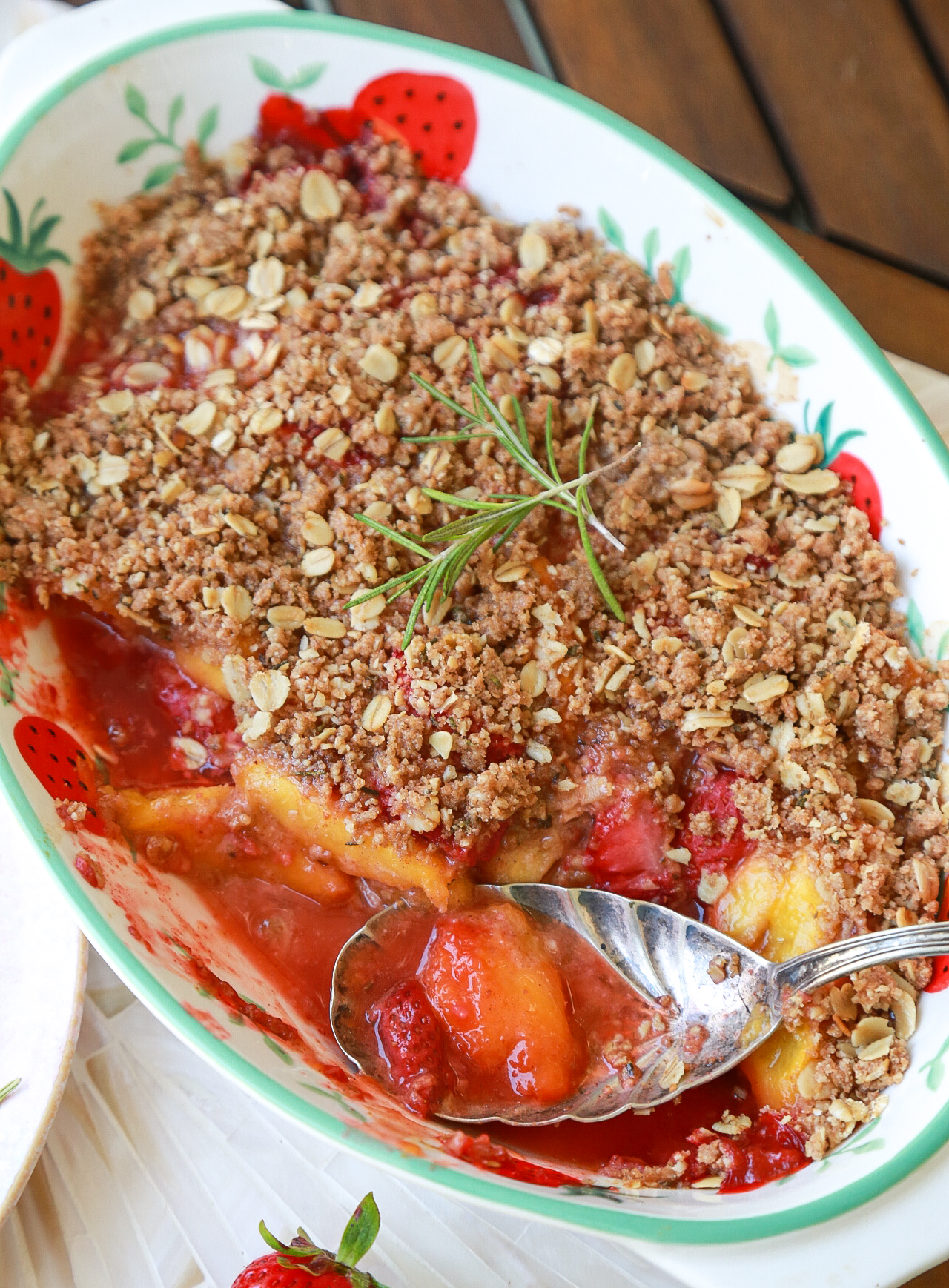 Peach and Strawberry Rosemary Crisp by Maren Swanson. #recipe #dessert #peaches #strawberry