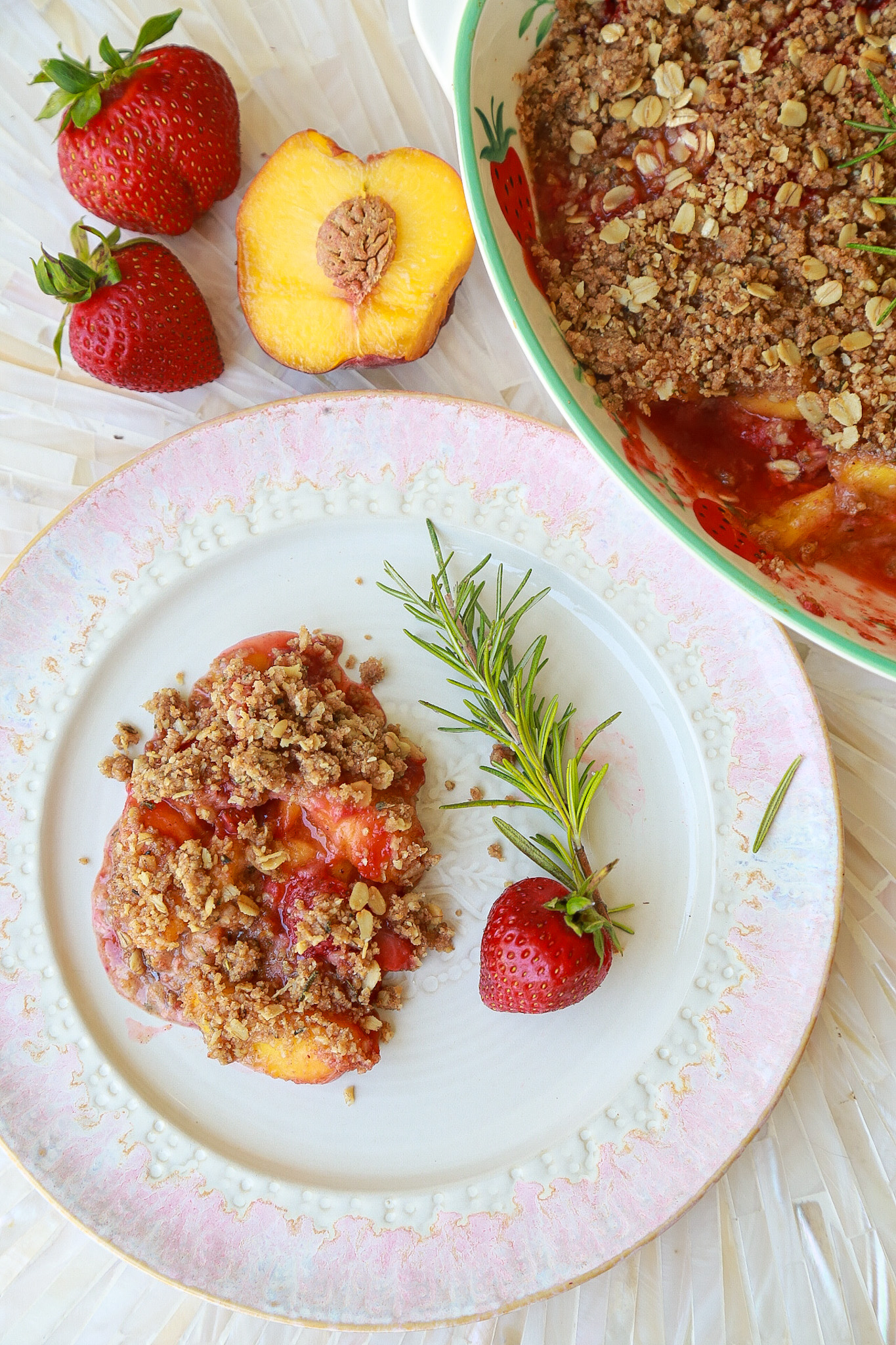 Peach and Strawberry Rosemary Crisp by Maren Swanson. #recipe #dessert #peaches #strawberries
